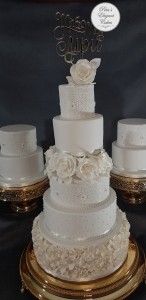 White Wedding Cake with Ruffles, Edible Lace, Quilting & Sugar Roses
