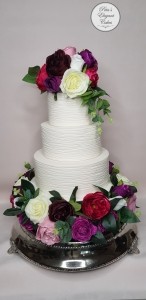 Roses on wedding Cake in Hot Pink, Burgundy, Purple Tones