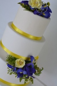 Blue & Yellow Occasion Cake, Cakes with Blue Flowers, Cakes with Iris Flowers, Cakes with Yellow Roses, Cake with Yellow Roses, Cake with Blue Iris Flowers, 3 Tiered Yellow & Blue Wedding Cake, Occasion Cake with Fresh Flowers