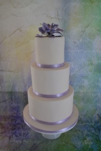 White and Mauve Wedding Occasion Cake with Mauve Orchids, Wedding Occasion Cakes Boonah, Wedding Occasion Cake Brisbane, Wedding Occasion Cake Gold Coast, Mauve Wedding Cake, Wedding Cake with orchids, Cakes with Flowers