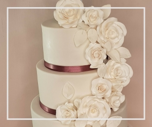 White Wedding Cake Cascading Roses