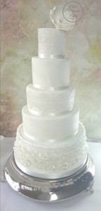 5 Tier Elegant White Wedding Cake wit Magnolia Flower Ruffles on Silver Plateau Stand